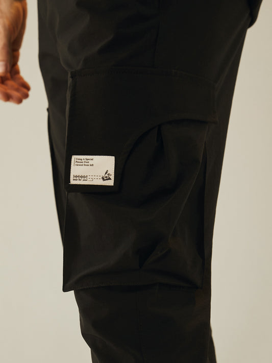 Mens pantalón parachute negro