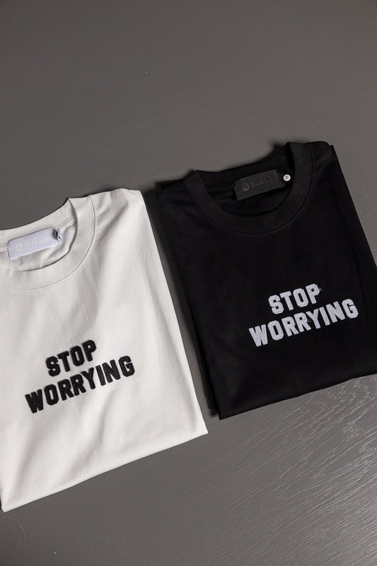 Mens t-shirt stop worring blanco-negro